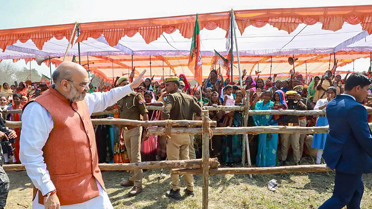 Union Home Minister Amit Shah arrives for a public meeting for the ongoing UP Assembly elections.