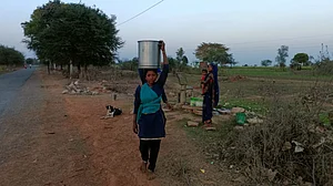 Women walking long distances to procure water in Mirzapur, Uttar Pradesh