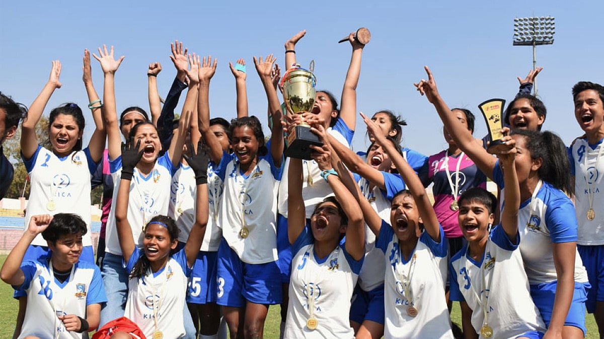 Hans Women FC players celebrate with the Delhi Women’s Premier League trophy.