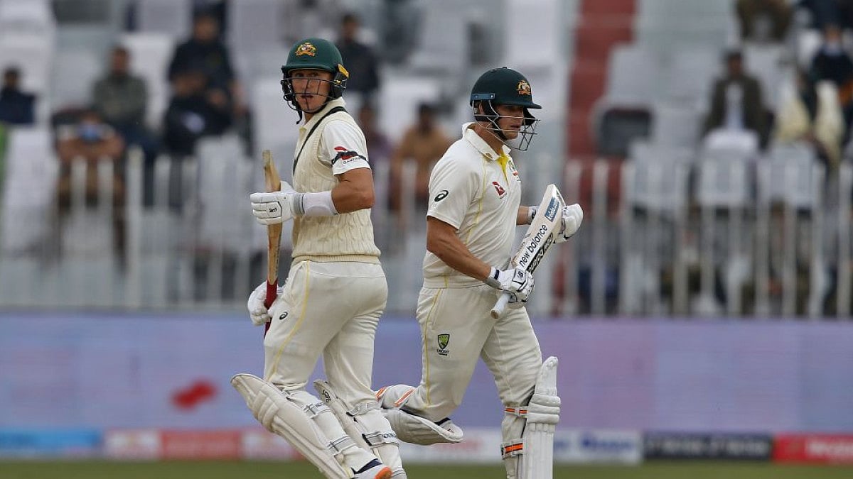 Steve Smith (R), Marnus Labuschagne run between wickets during 3rd day of first PAK Vs AUS Test.