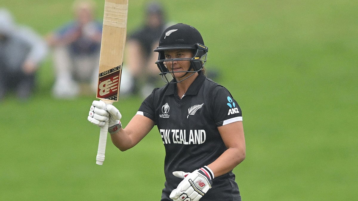Suzie Bates raises her bat after scoring a half-century against Bangladesh in Dunedin.