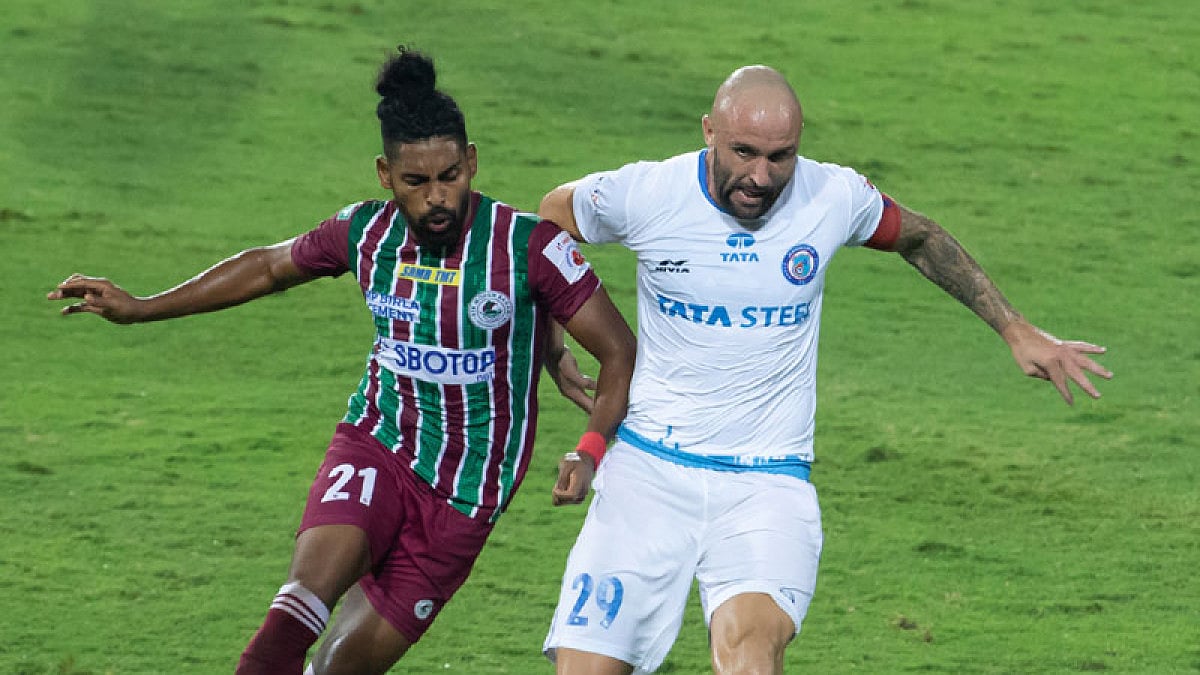ATK Mohun Bagan's Roy Krishna and Jamshedpur FC's Peter Hartley in action during their ISL match.