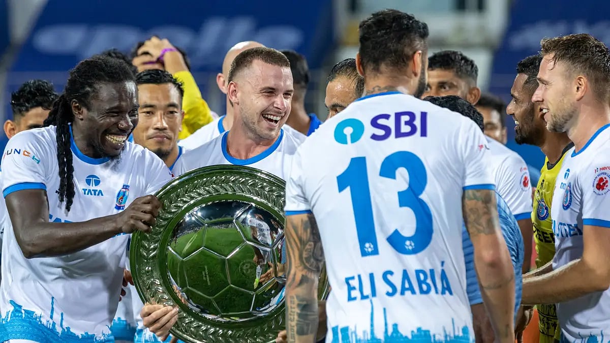 Jamshedpur FC players celebrate after winning the ISL 2021-22 League Winners' Shield in Goa. 