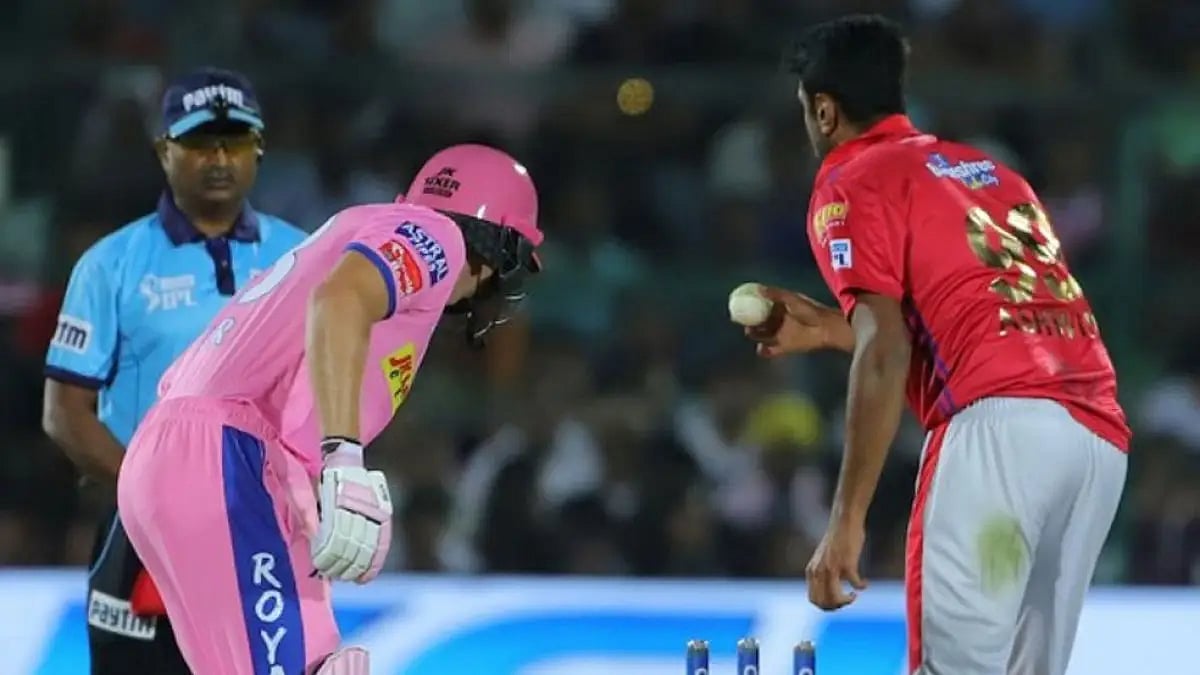 Ravichandran Ashwin dismisses Jos Buttler using 'Mankad' during an IPL match.