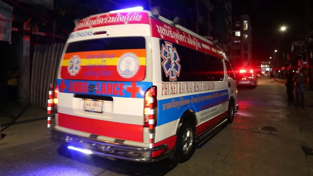 An ambulance carrying Shane Warne's body on its way to Bangkok international airport.