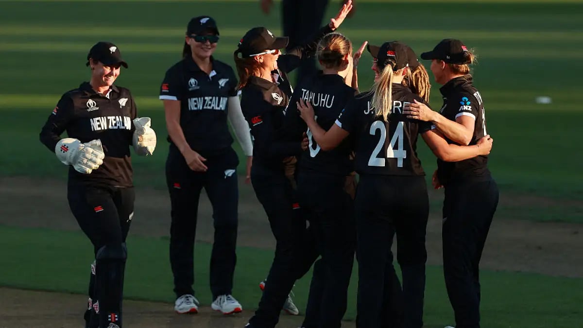 New Zealand players celebrate the fall of an Indian wicket. Get highlights of IND-W vs NZ-W.
