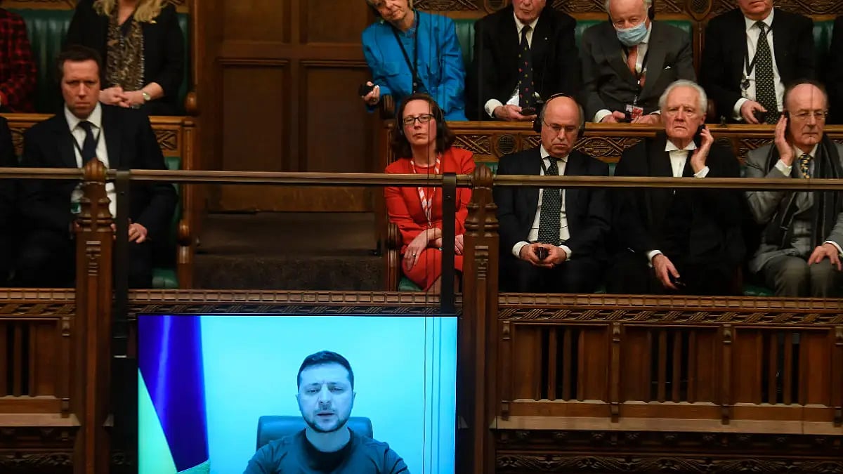 In this photo provided by UK Parliament, Ukrainian President Volodymyr is displayed on the screen