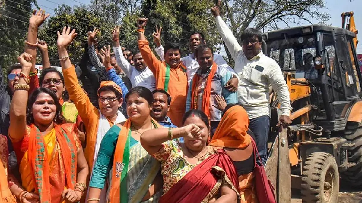 UP Election Results 2022 BJP supporters celebrate with a bulldozer