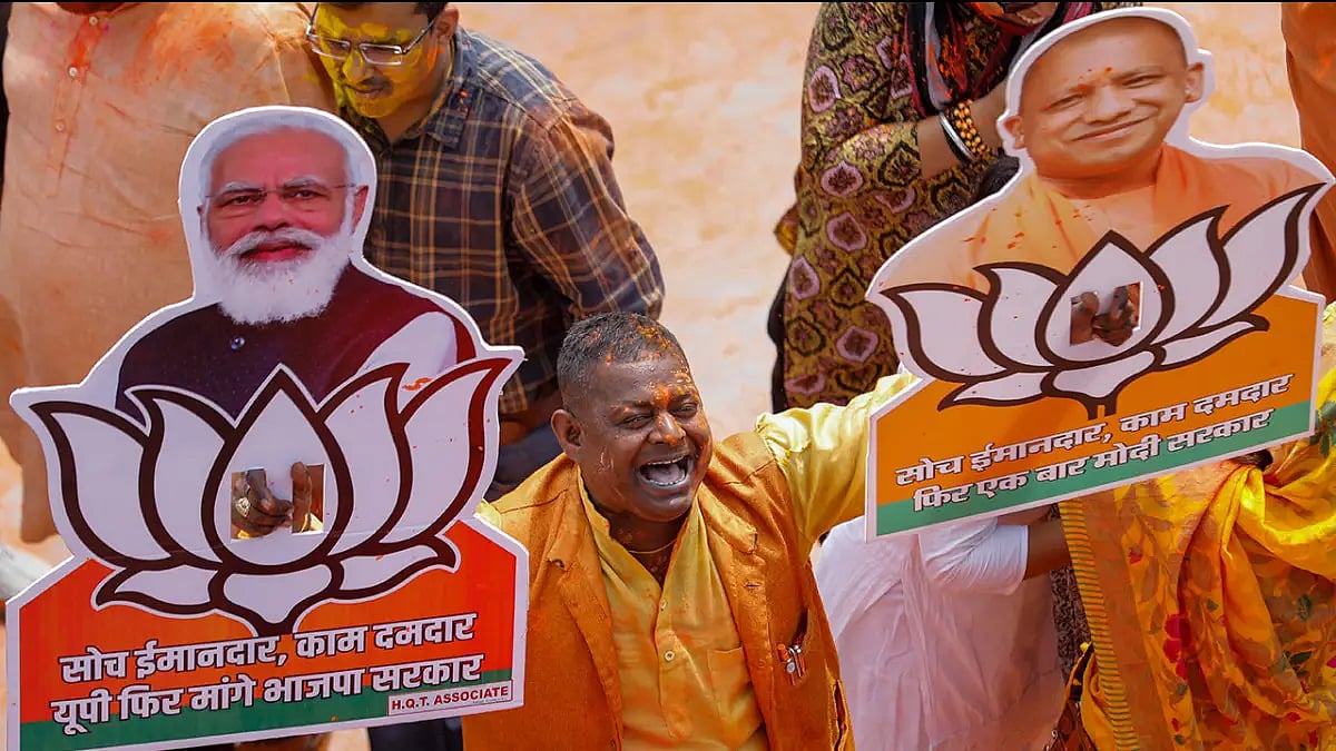 A BJP supporter celebrating election results