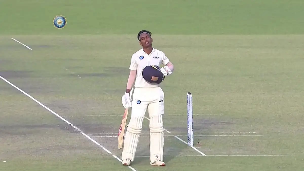 Jharkhand's Kumar Kushagra celebrates after completing his ton against Nagaland in Ranji Trophy.