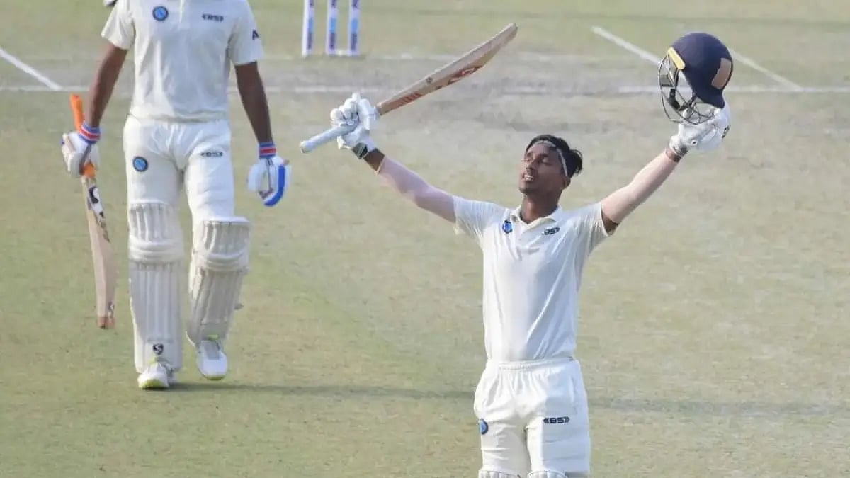 Jharkhand's Kumar Kushagra celebrates after reaching his double hundred against Nagaland in Kolkata.