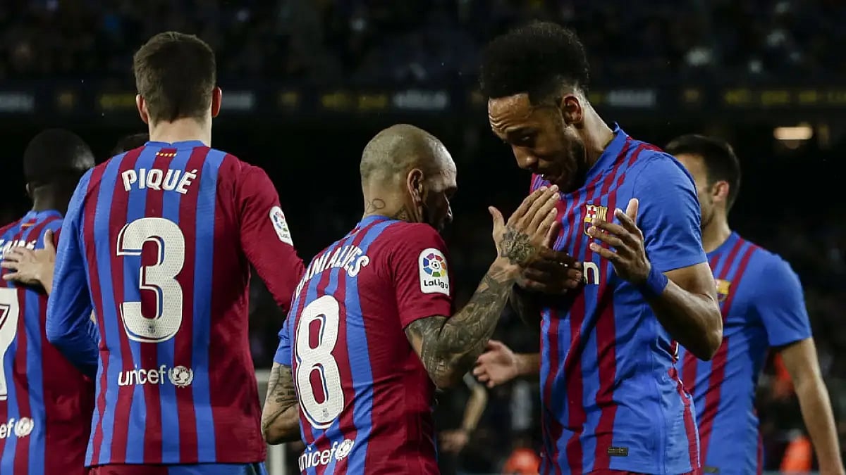 Barcelona's Pierre-Emerick Aubameyang, right, celebrates after scoring a goal against Osasuna.
