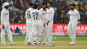 India players celebrate a Sri Lankan wicket on Monday. Get highlights of IND vs SL.