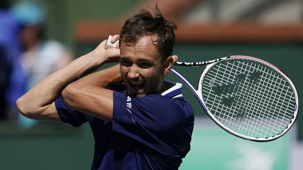 Daniil Medvedev returns a shot to Gael Monfils during their BNP Paribas Open match in Indian Wells.