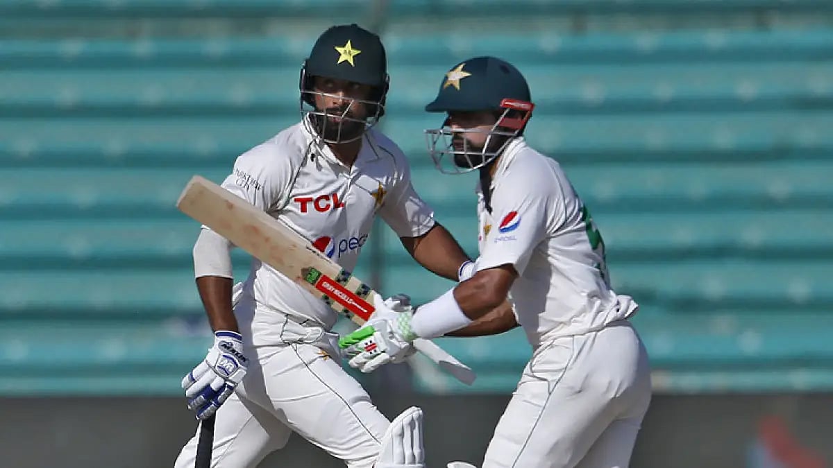 Pakistan's Babar Azam and Abdullah Shafique take a run on Day 4 of the 2nd Test against Australia.