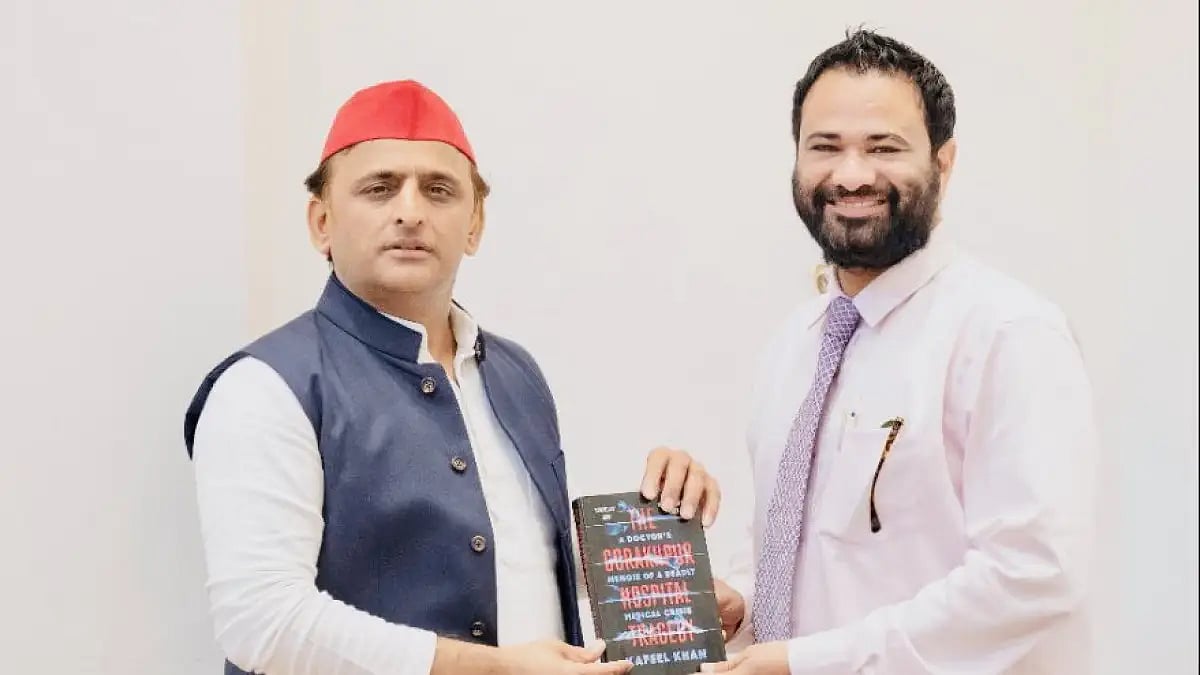 Dr Kafeel Khan with SP chief and former UP CM Akhilesh Yadav after the launch of his book 
