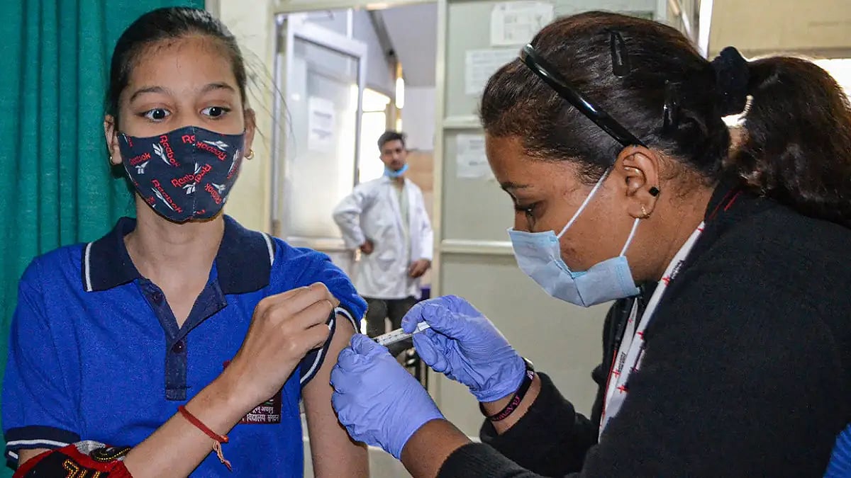 A child being vaccinated against COVID-19