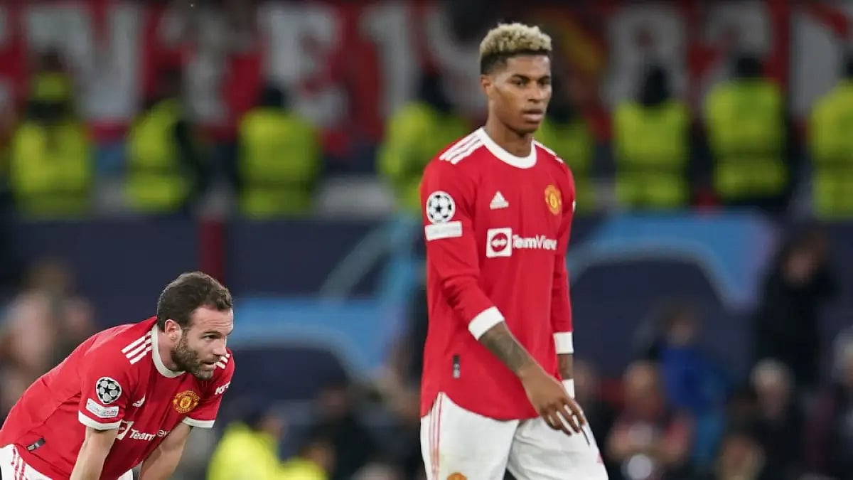 Marcus Rashford (R) missed the start of the season due to injury.