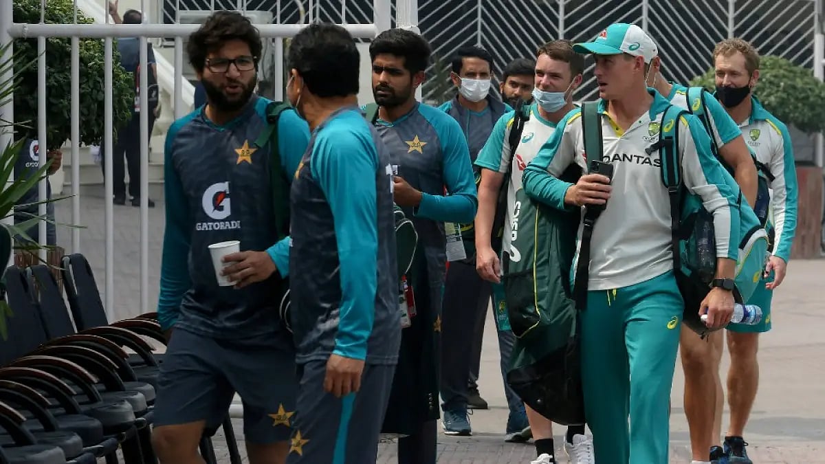 Pakistan and Australia players arrive for practice at the Gaddafi Stadium in Lahore.  