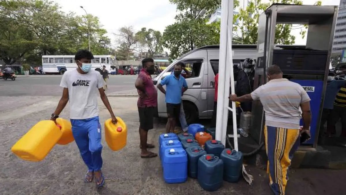 Sri Lankan bus drivers are carrying empty oil containers as fuel price hike badly hits the country.