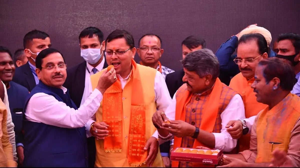 Pushkar Singh Dhami being congratulated at BJP Uttarakhand HQ after election results