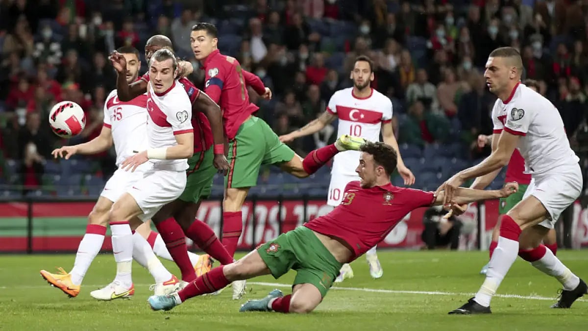 Portugal and Turkey players in action during their World Cup 2022, European qualifying playoff match