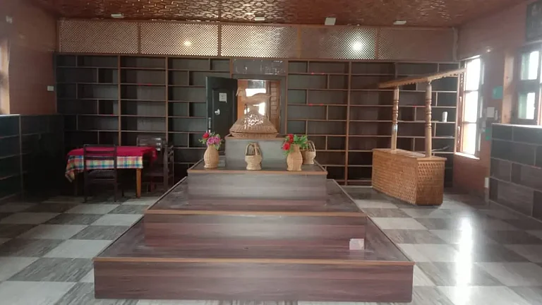 The empty shelves at the bookshop after its closure - null