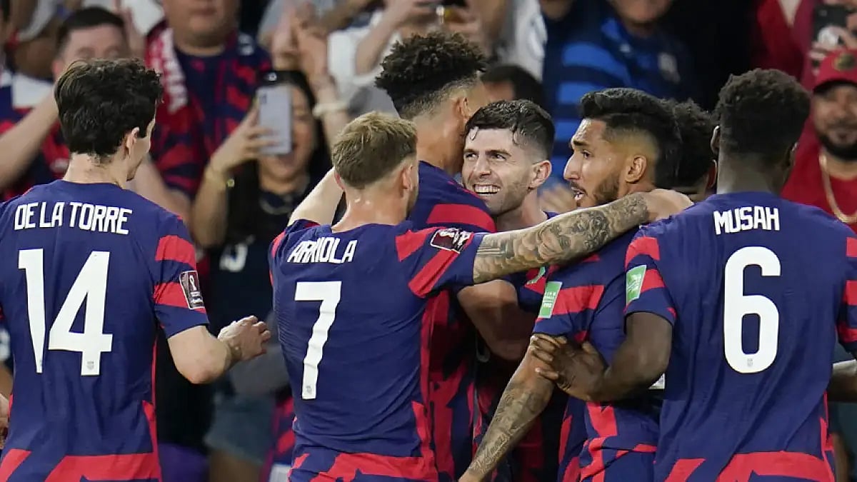 USA players celebrate with Christian Pulisic during their FIFA World Cup qualifier vs Panama.