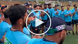 Gujarat Titans players gather for the announcement of Rashid Khan as team vice-captain.