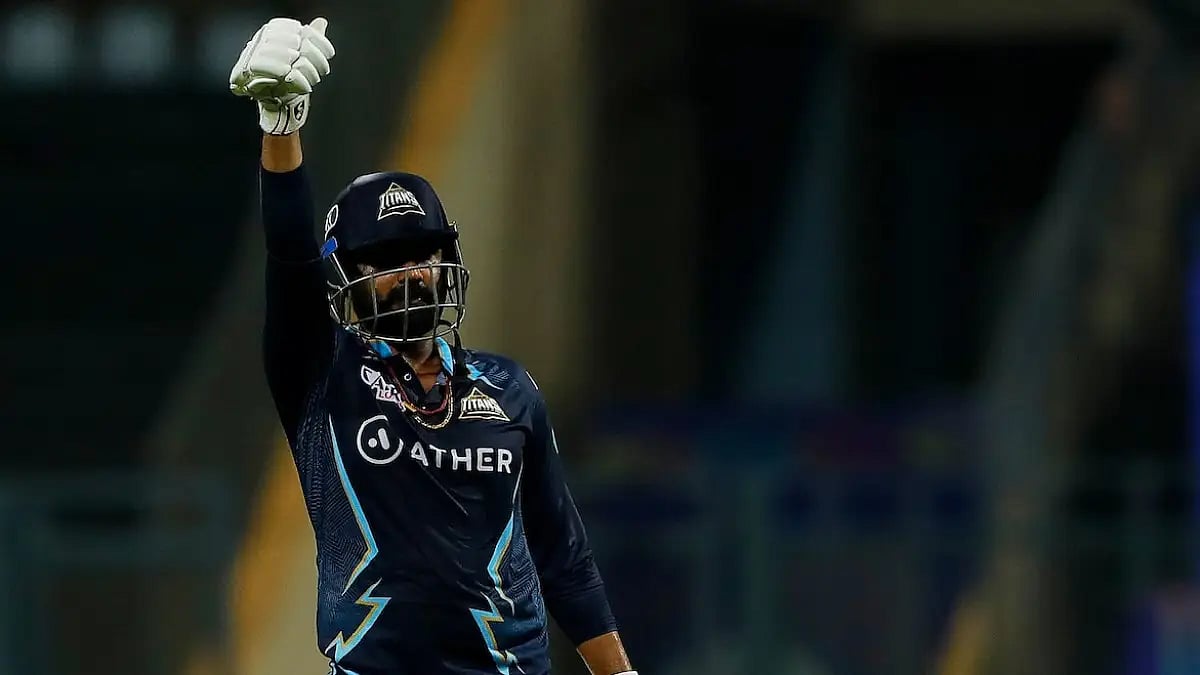 Rahul Tewatia gestures after hitting the winning runs against Lucknow Super Giants in IPL 2022.     