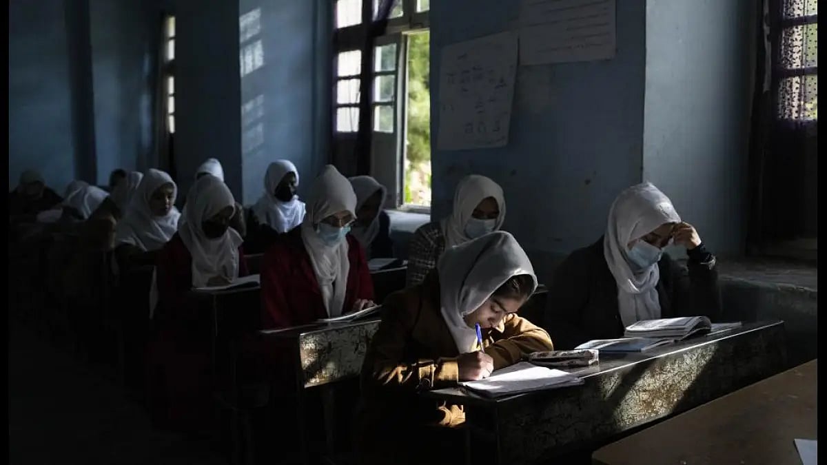 Afghan girls participate in a lesson at Tajrobawai Girls High School in Herat, Afghanistan.