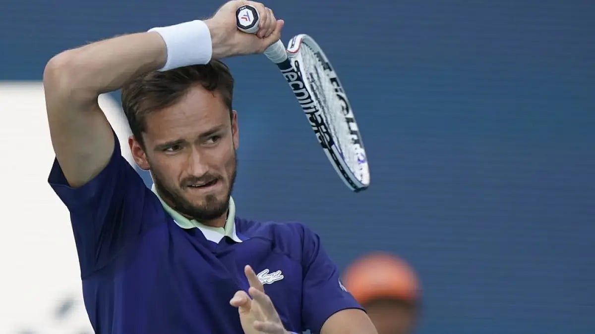 Daniil Medvedev returns a shot from Jenson Brooksby during Miami Open tennis tournament.