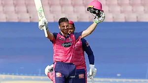 Rajasthan Royals' Jos Buttler celebrates after his century against Mumbai Indians in IPL 2022.