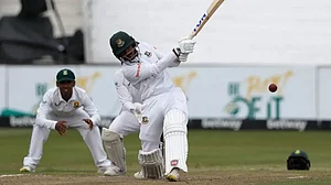 Mahmudul Hasan Joy hits a shot en route to his 137 against South Africa. Get highlights of SA vs BAN.