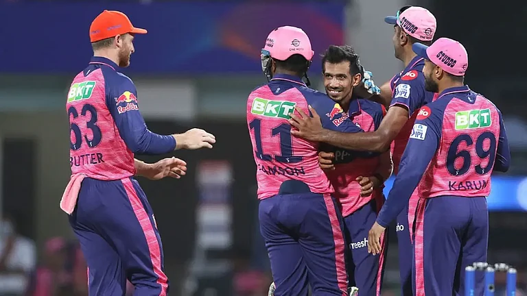 Yuzvendra Chahal celebrates after taking a Mumbai Indians wicket in IPL 2022. - null
