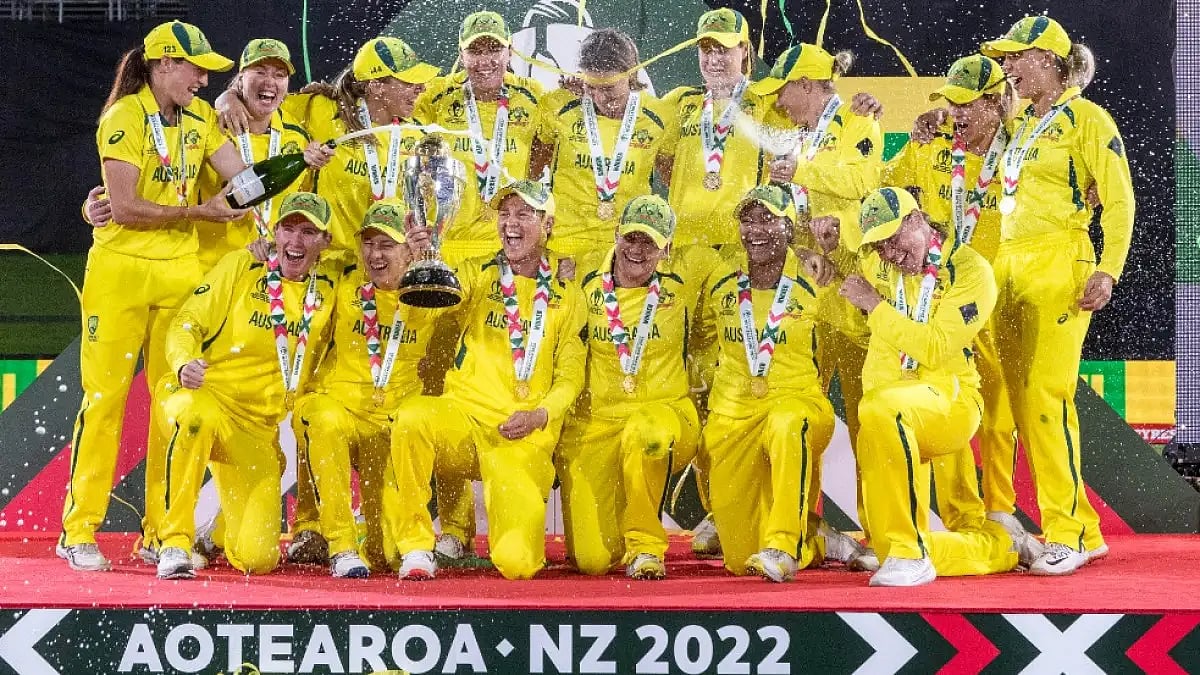 Australia players celebrate with ICC Women's World Cup 2022 title after beating England in final.