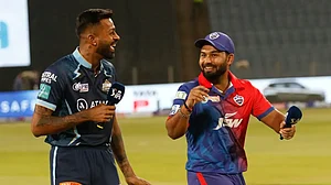 Delhi Capitals captain Rishabh Pant in an smiles with Gujarat Titans counterpart Hardik Pandya.