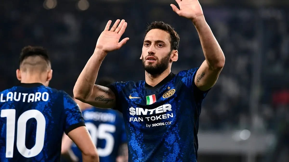 Inter Milan's Hakan Calhanoglu celebrates after scoring against Juventus in Serie A 2021-22 tie. 