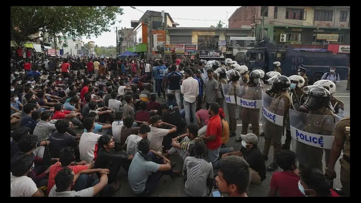 Sri Lankan students protesting during a curfew in Colombo demanding the government step down. 