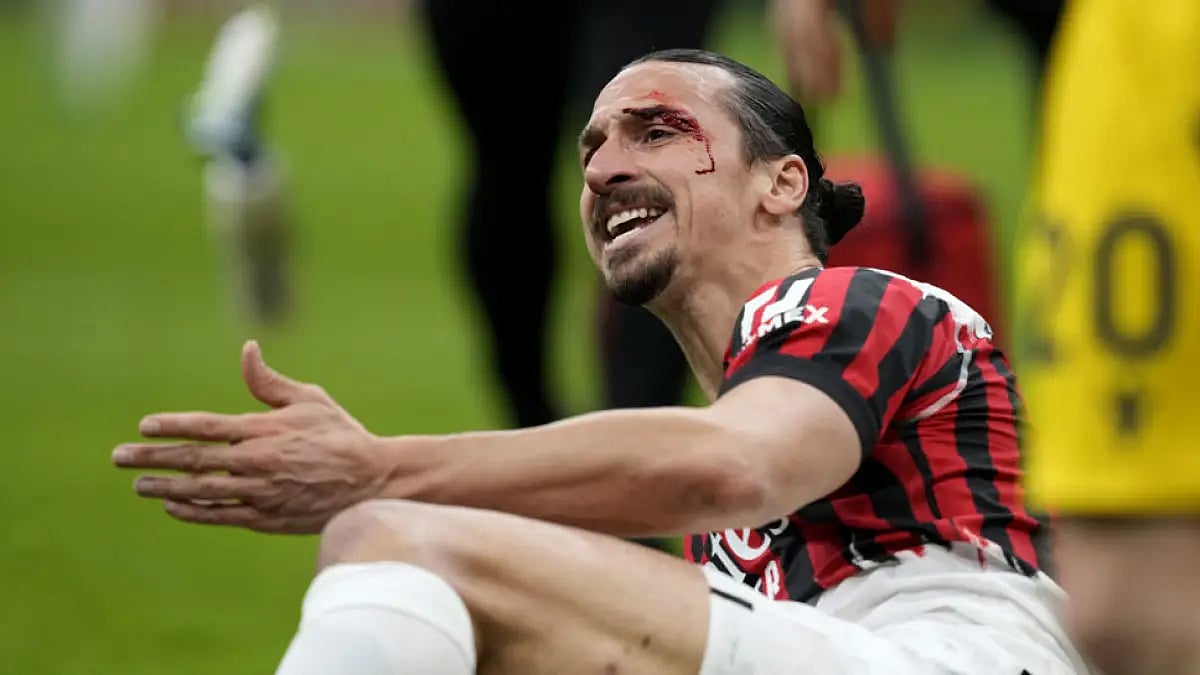 AC Milan's Zlatan Ibrahimovic is injured during their Serie A match against Bologna.