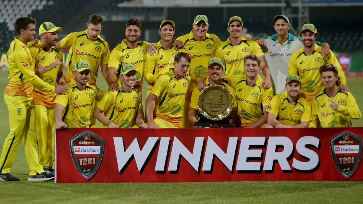 Australian players celebrate with the winners' trophy after beating Pakistan in one-off T20. 