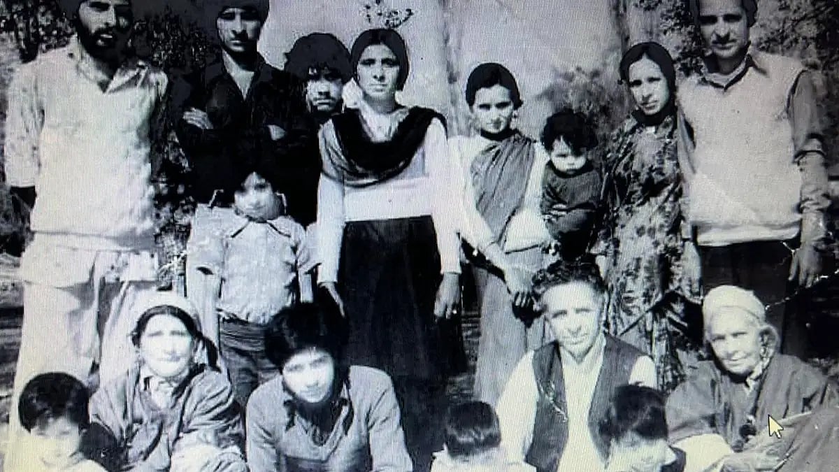 Kashmiri Pandit poet Kashi Nath Raina's joint family in their ancestral home in Anantnag