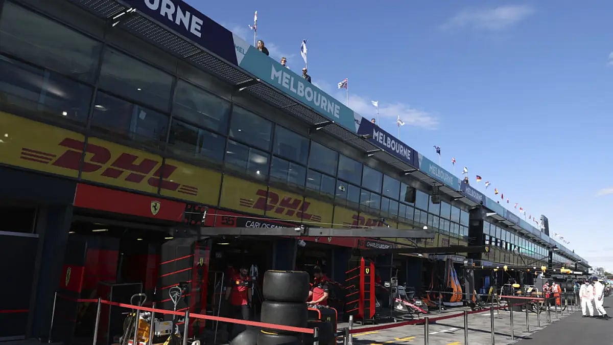 F1 teams prepare their garages at the track ahead of the Australian Grand Prix in Melbourne.