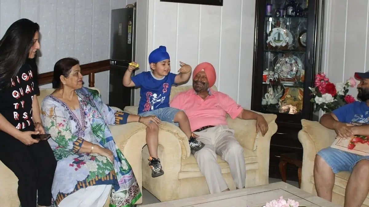 Tawinderjit Singh Modi along with his family at their Jammu home.  - null