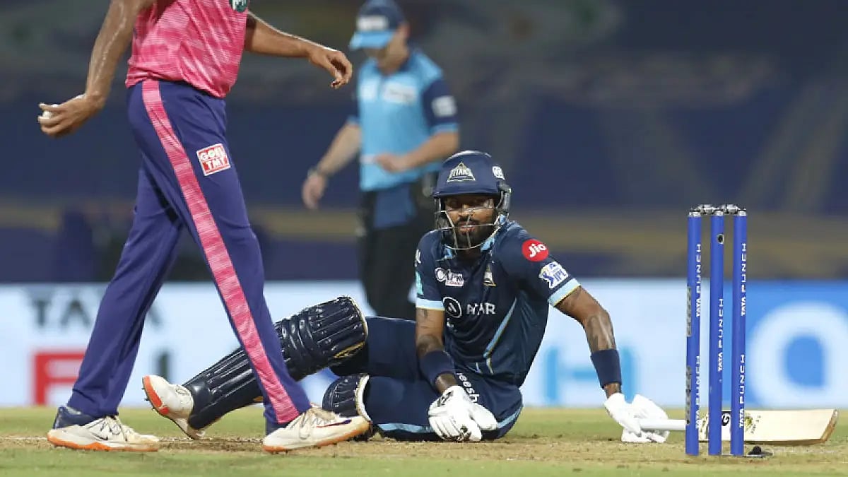 Gujarat Titans captain Hardik Pandya, on the ground, during their IPL 2022 match against Rajasthan Royals in Mumbai.