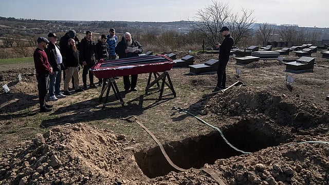 Russia Strikes Ukraine's Big Cities, Bears Down On Mariupol