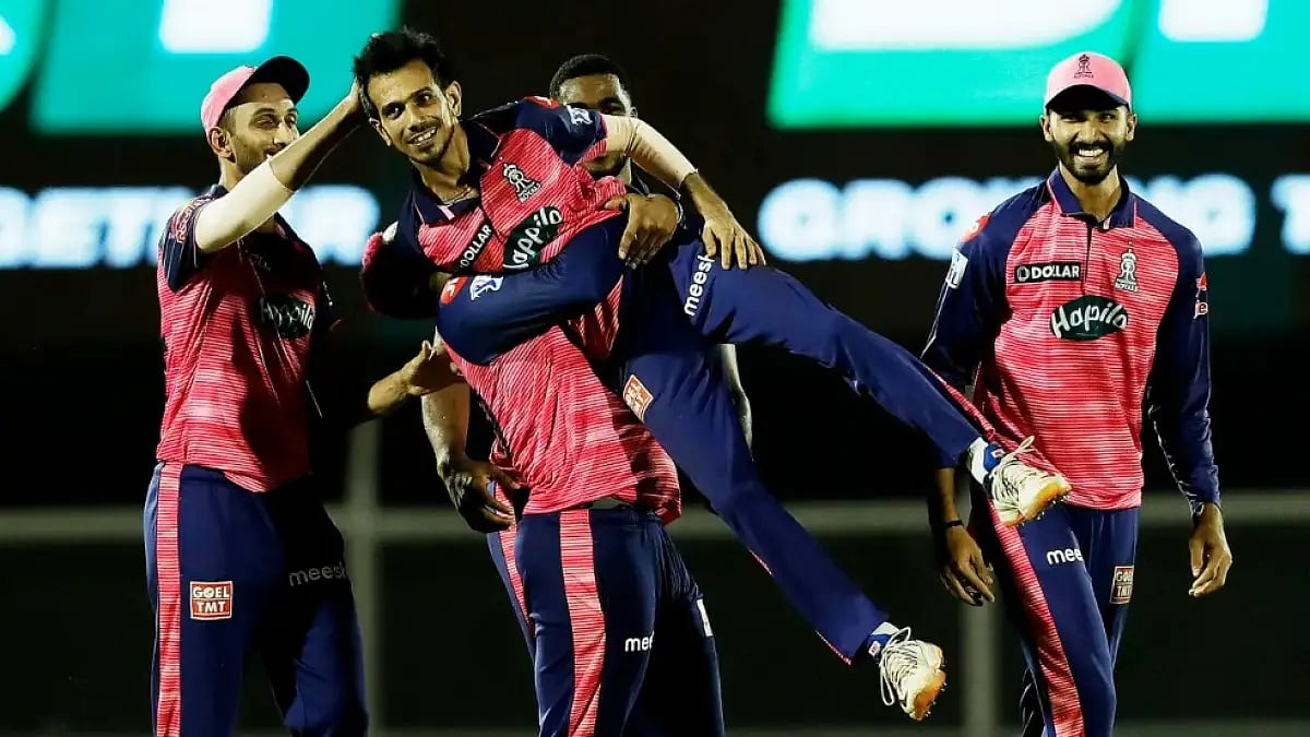 Yuzvendra Chahal celebrates with teammates after completing his hat-trick against KKR in IPL 2022.