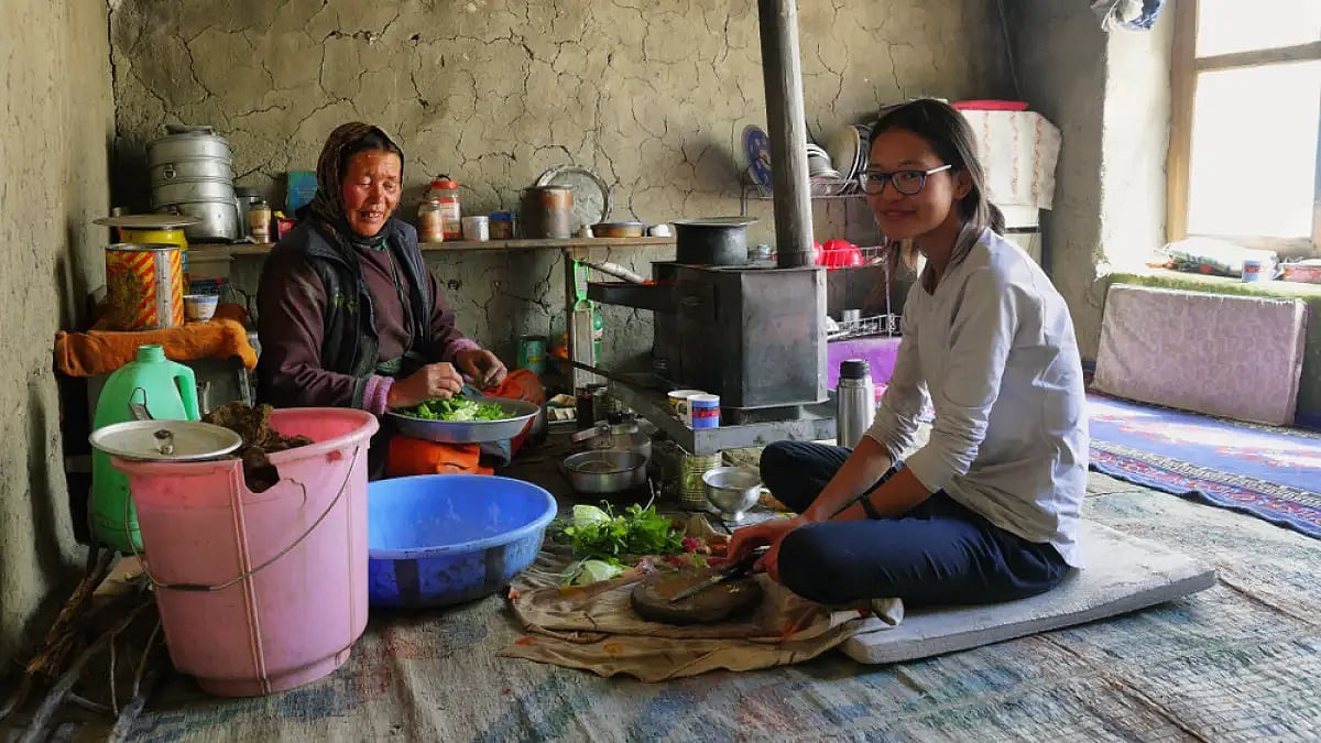 Rustling up a meal with local ingredients at a homestay in Ladakh.
