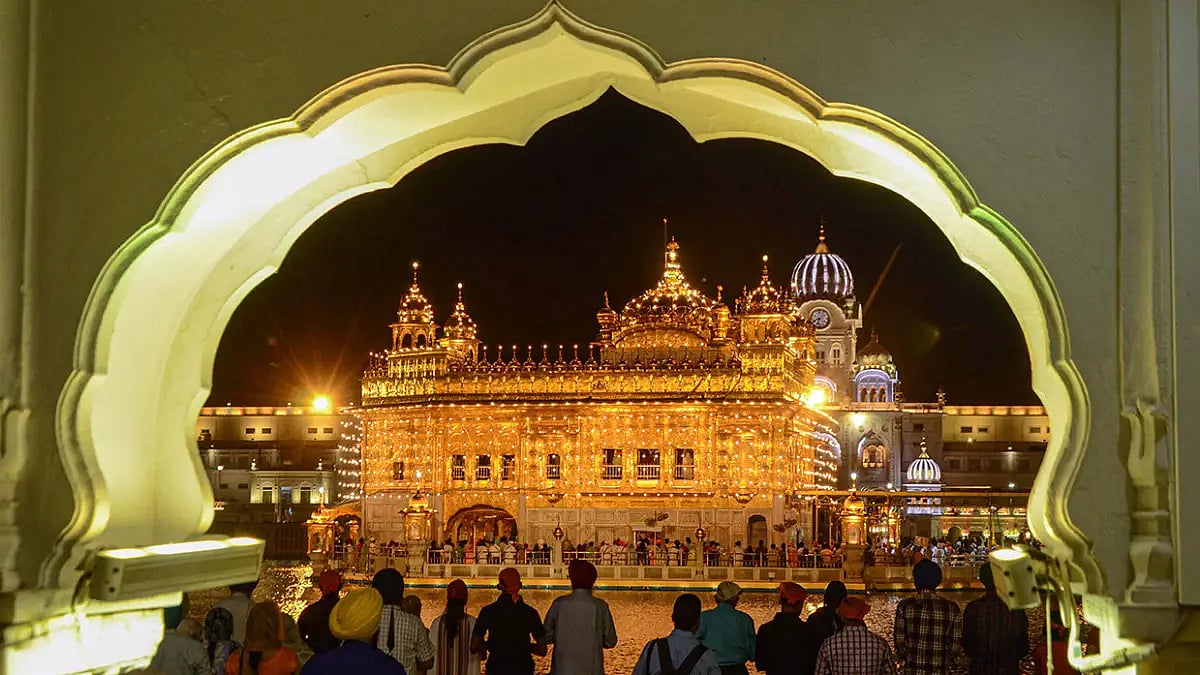 Illuminated Golden temple in Amritsar 	