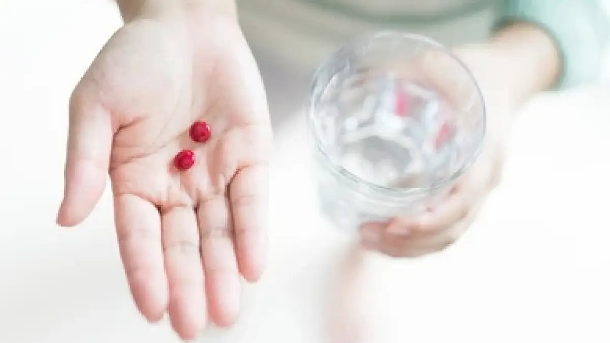 Women consuming iron tablets 
